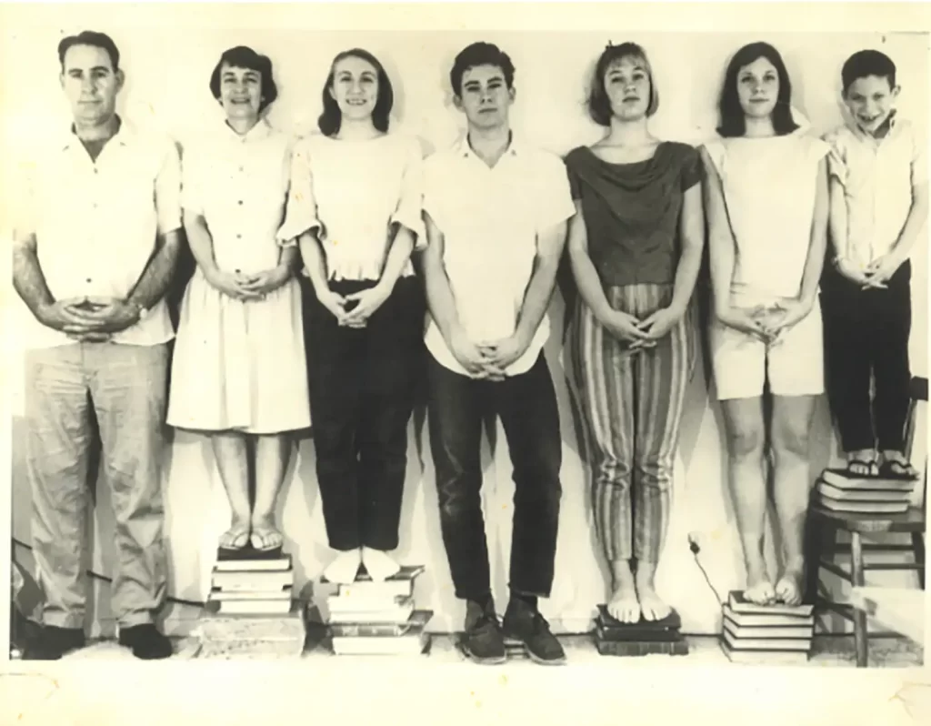 Photo project with Carolyn at UCLA, Spring 64, her family stood on books to achieve level eye height