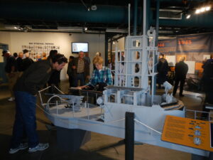 4 scale model of USS Silversides gun deck with explanations of crew stations and duties here.