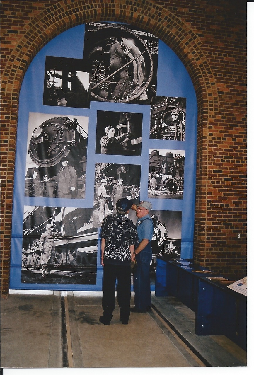 Historic photos recall work in the roundhouse and its backshop. Jeff Abshear was the project’s graphic designer.
