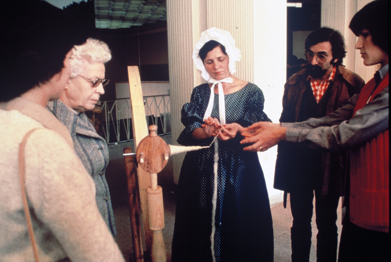 The exhibition included staff from the six American museums represented. Here, two from Old Sturbridge Village, MA demonstrate spinning. An underlying message was America’s deep craft tradition.