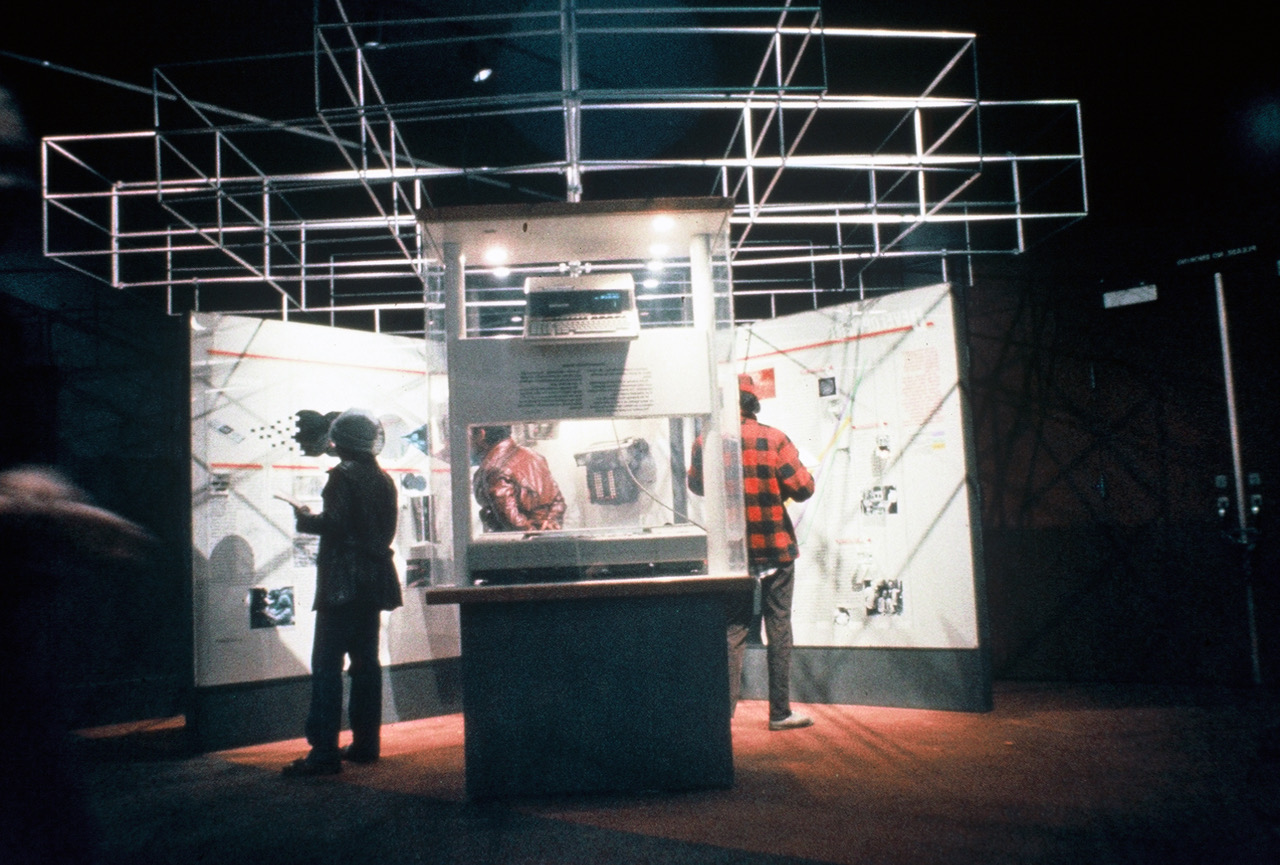 This kiosk introduces microchip manufacture, most of which has been done in the U.S. since the industry began here in the ’70’s. In the foreground, an HP color flatbed printer demonstrated the catchy idea for that time that a microprocessor-driven device could print graphics from digital files.